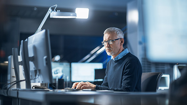 man with desktop