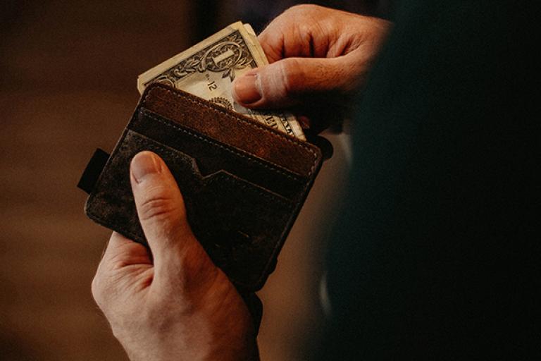 man using wallet